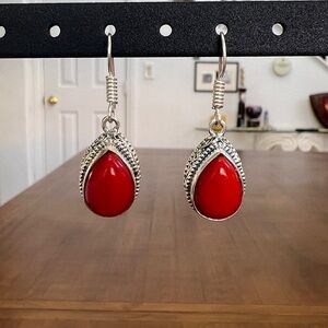 CORAL AND 925 STERLING SILVER EARRINGS.